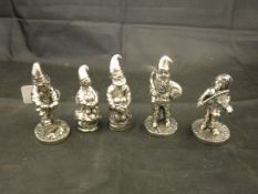 A set of five cast metal dwarf figurines