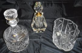 A collection of glass ware to include a pair of candlesticks by Redel, various modern scent bottles,