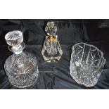 A collection of glass ware to include a pair of candlesticks by Redel, various modern scent bottles,