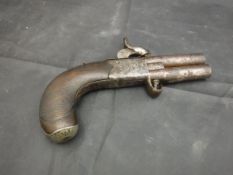 A 19th Century over and under pistol indistinctly signed to the lock,