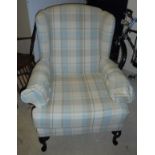 A Wesley-Barrell wing back arm chair in a duck egg blue,