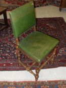 A set of six Victorian dining chairs, the green leather backs above matching seats,