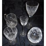A collection of glass ware to include various cut glass wine glasses,