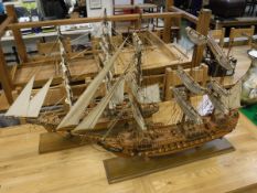 A pair of scratch built tall masted ships with gun ports