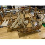 A pair of scratch built tall masted ships with gun ports