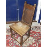 A set of five hard seated panel back dining chair raised on square section legs to stretchered