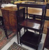 A 19th Century three tier flame mahogany wotnot raised on ringed and turned supports to drawer base