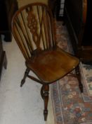 A set of six wheelback Windsor chairs with crinoline stretchers CONDITION REPORTS