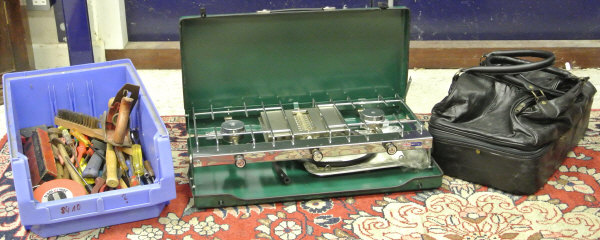 A collection of assorted hand tools, together with a Tilly gas stove,