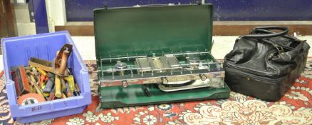 A collection of assorted hand tools, together with a Tilly gas stove,