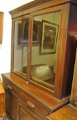 An early 20th Century mahogany bookcase cabinet,