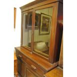 An early 20th Century mahogany bookcase cabinet,