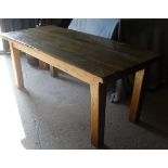 A modern oak farmhouse style kitchen table,
