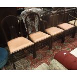A set of four 19th Century hoop backed mahogany dining chairs with pierced splat backs in the