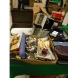 A box of assorted plated cutlery etc together with a modern upholstered foot stool, a projector,
