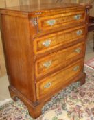 A walnut bachelor chest of small proportions in the early 18th Century manner,