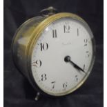 A late 19th Century brass cased drum clock,