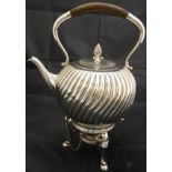 A early 20th Century spirit kettle with mahogany handle and wrythen decoration,