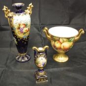 A Coalport twin-handled vase decorated with pears and blackberries signed "M.