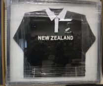A framed and glazed New Zealand All Blacks rugby shirt,