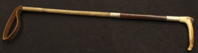 A child's riding crop with antler handle and plated ferrule,