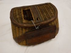 A French reed fishing creel, leather bound with front pouch,