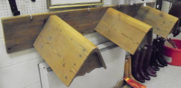 A pine saddle rack for three saddles