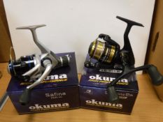 A collection of eight boxed and un-used Okuma fixed spool reels to include five SN-40 reels and