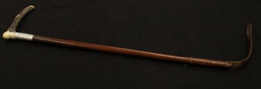 A ladies riding crop with antler handle and silver ferrule stamped "Merle & Co." and engraved "E.
