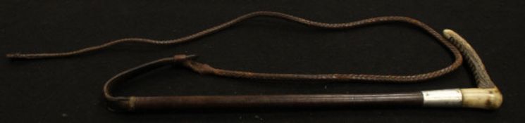 A ladies riding crop with antler handle and plated ferrule,