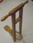 A ladies ash free-standing bootjack