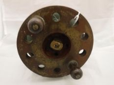 An "Overseas" 6" diameter Frog Back wooden fishing reel