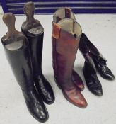 A pair of ladies black Hunting boots (size 7),