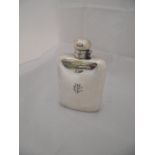 An early 20th Century silver-plated hip flask of large proportions, initialled "MEJ" to front,