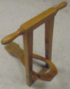 A child's ash free-standing bootjack