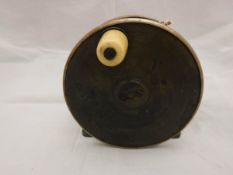 A Malloch 3½" brass plate wind wheel with nickel silver rim and ebonised back plate