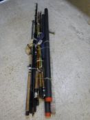 A collection of thirteen assorted fishing rods to include examples for fly fishing, sea fishing,