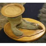 A taxidermy stuffed and mounted Ostrich foot as a dish with turned bowl,
