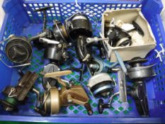 A collection of nine fixed spool fishing reels to include examples by Mitchell, J W Young & Sons,