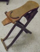 A circa 1900 collapsible boot jack / foot rest for tying laces CONDITION REPORTS