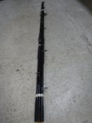 Two 12ft beach casting rods by Normark and Middy