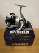 A collection of twelve boxed and un-used Okuma Safina SNR-40 fixed spool reels