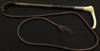 A gentleman's riding crop with antler handle and button inscribed "Callow S Mount Street London"