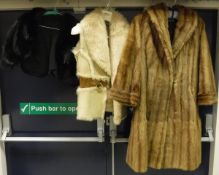 A black fur shrug, together with a Temperley of London sheepskin gilet and a mink coat by A.