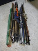 A large collection of assorted coarse fishing rods, bank sticks,