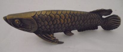 A modern bronze model of a carp