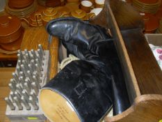 A box containing various sundry items including Pryor letter stamps, a pair of size 7 black riding