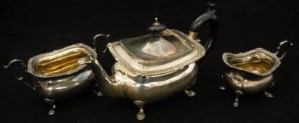 A three piece Victorian silver bachelors tea set comprising teapot, twin handled sucrier and milk