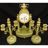 A French onyx and gilt brass cased clock garniture, the 8-day movement by Mougin with floral painted