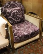 An Art Deco style armchair with mahogany show frame and velvet upholstery, together with a mid